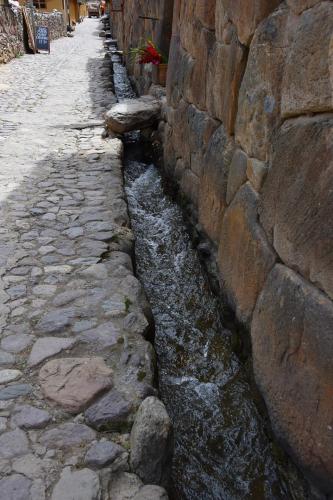 Inca aqueduct running through Pisac 